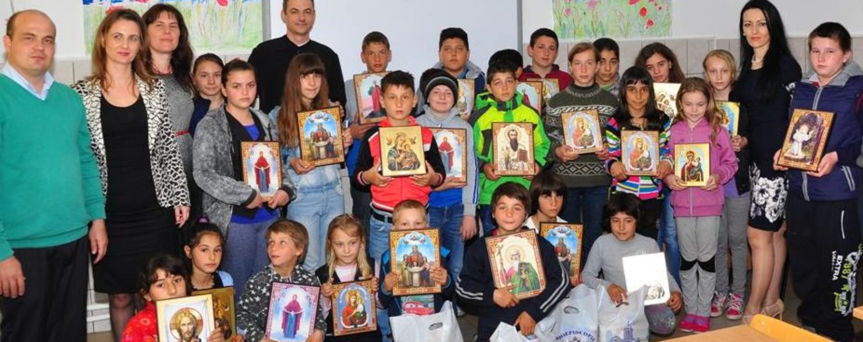 Arhiepiscopia Târgovişte: Daruri pentru copii ai Şcolii ”Pictor Nicolae Grigorescu” din Titu